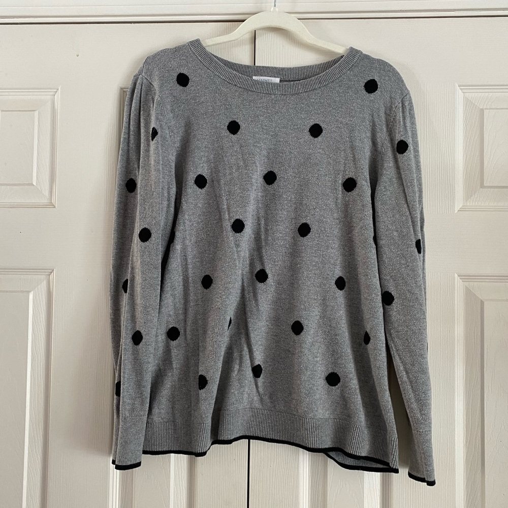 Gray sweater with black polkadots.
